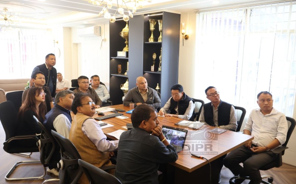DC Kohima, B Henok Buchem, with officials during the DPR presentation on the rehabilitation of existing bridges on May 14. (DIPR Photo)